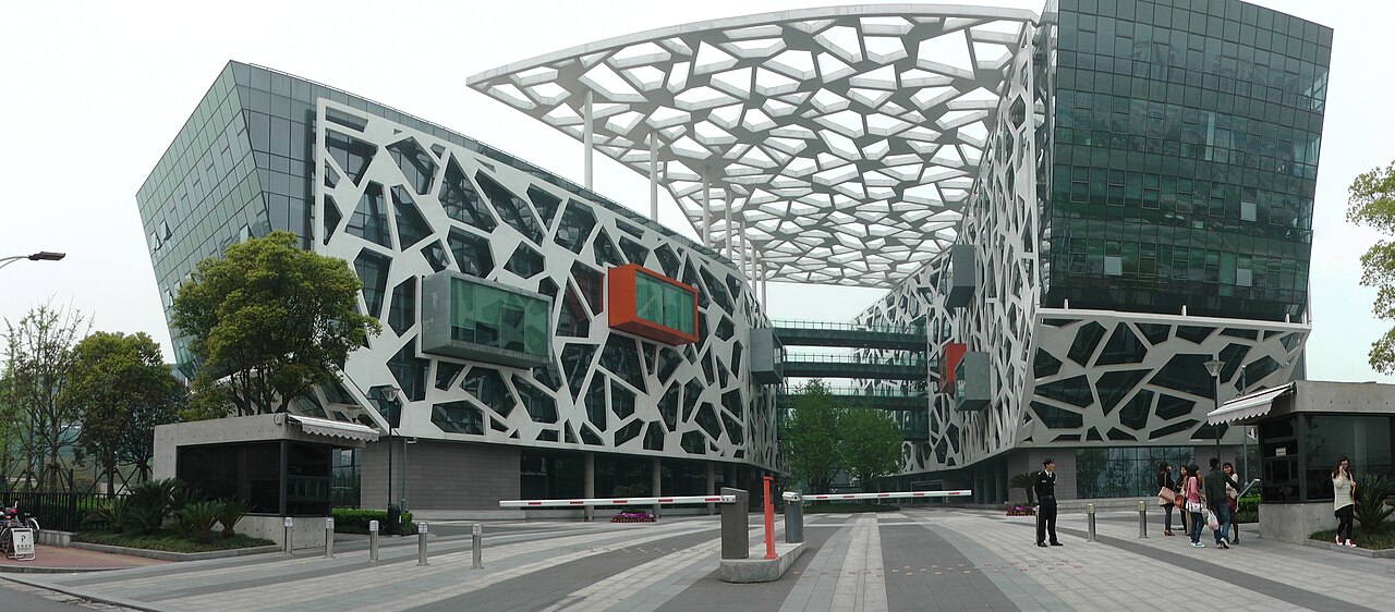 Alibaba Group headquarters buildings with a patterned facade and a lattice canopy in Hangzhou