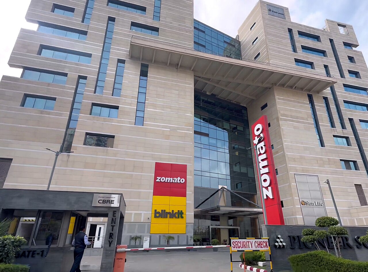 Eternal headquarters building with Zomato and Blinkit signs at the entrance
