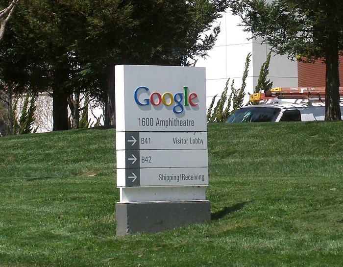 Google welcome sign on a lawn outside the Googleplex in Mountain View, California