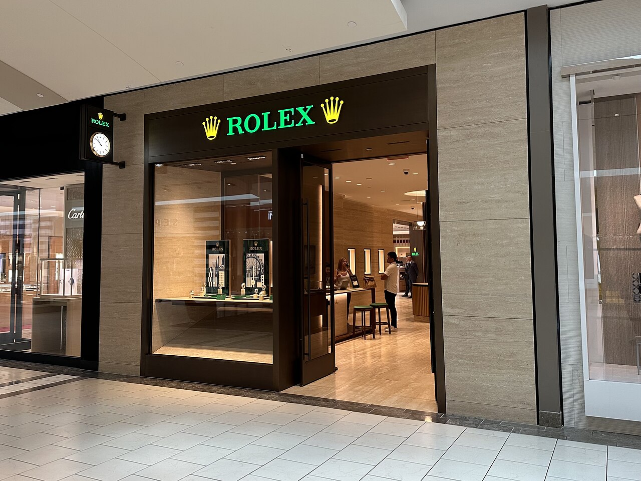 Rolex storefront at Dadeland Mall with a green wordmark and gold crown.