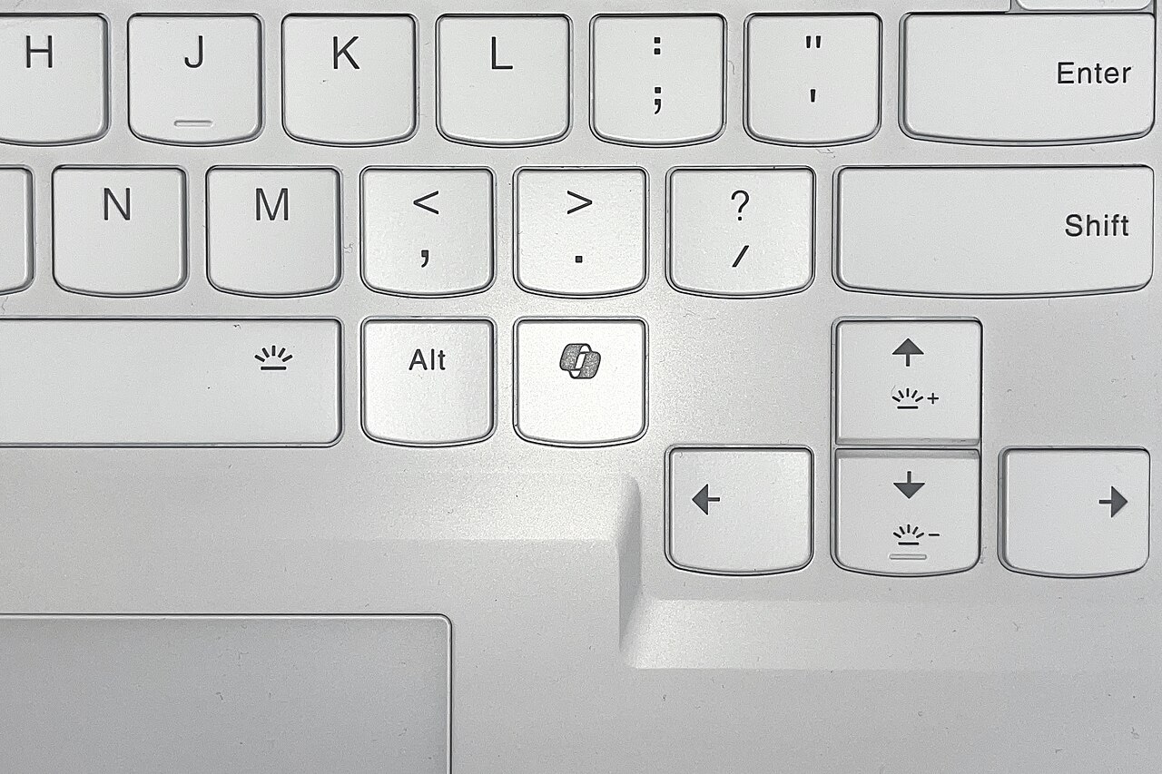 Close-up of a laptop keyboard with the Copilot key beside the right Alt key